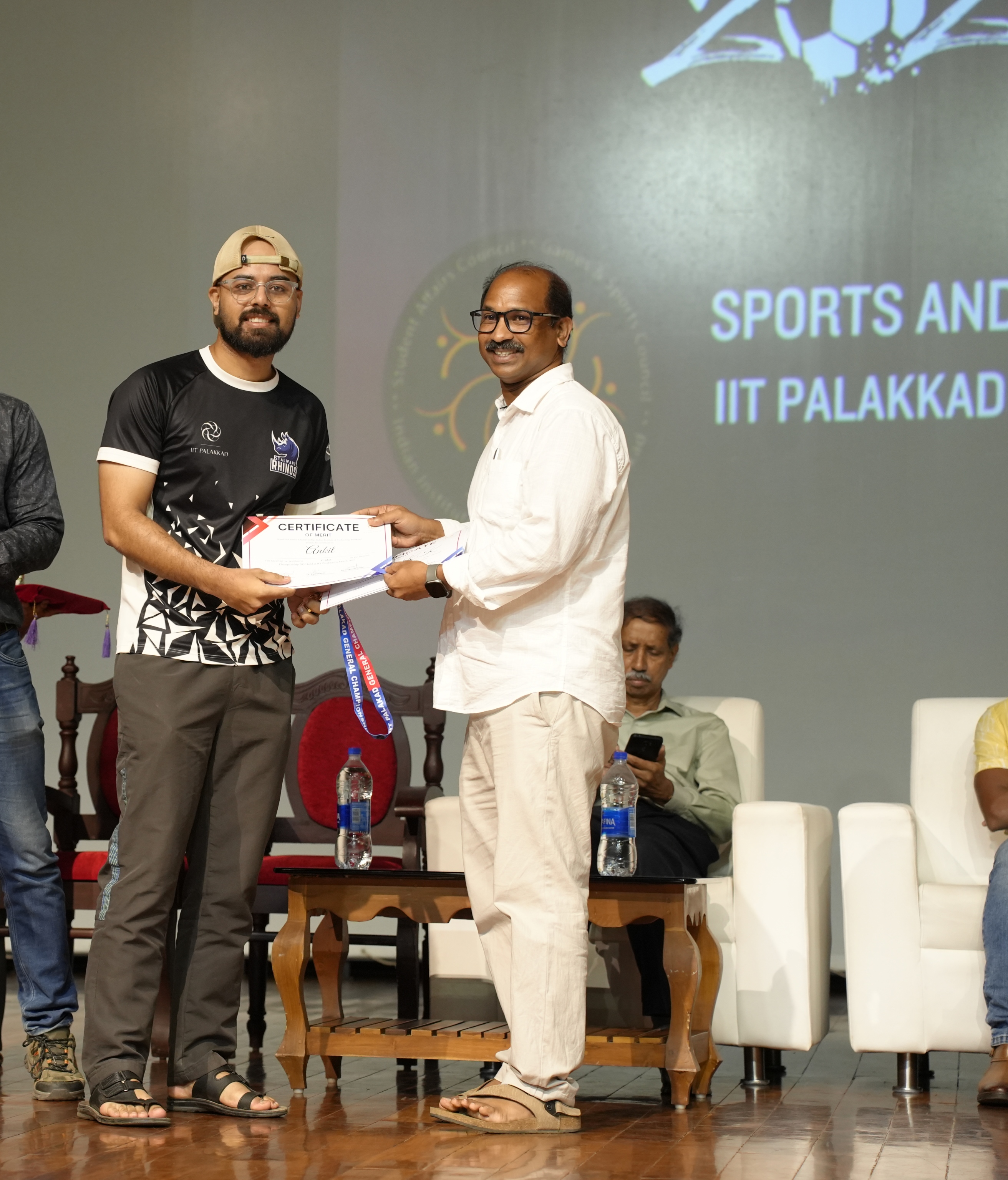 Receiving the winning certificate after securing the Cricket General Championship at IIT Palakkad